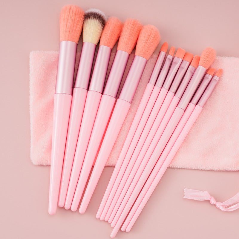 Supersonic 13-piece makeup brush set with concealer, blush, powder, eyeshadow, highlighter, and foundation brushes for beauty application.