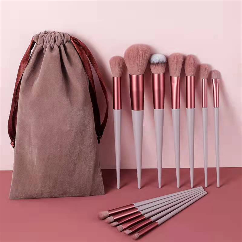 Set of 13 Supersonic makeup brushes including concealer, blush, powder, eye shadow, highlighter, and foundation brushes for cosmetics.