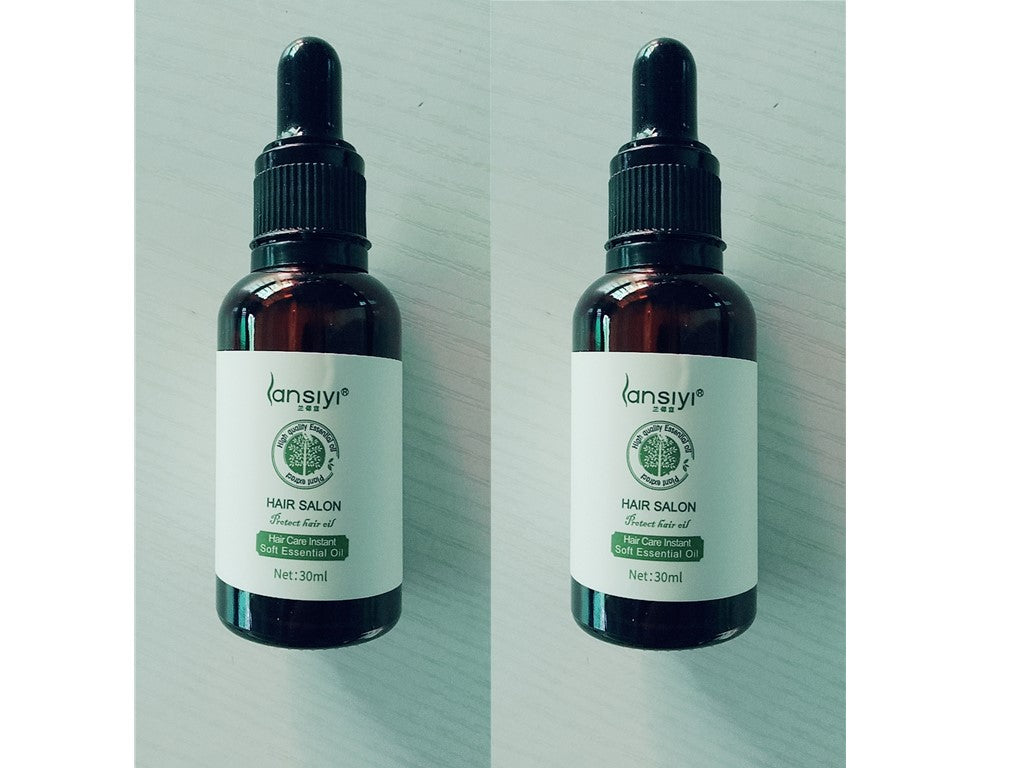 Supersonic Hair Care Essential Oil bottle with dropper, natural hair treatment for shine and nourishment.